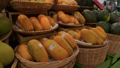 fruit and vegetables displayed in baskets at grocery store, phitsanulok central plaza, thailand