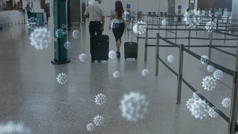 covid-themed animation shows airport workers and social distancing.