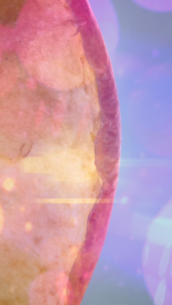 animación de puntos de luz sobre la manzana