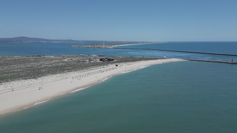 Aerial-of-virgin,-not-crowded-beach-off-the-Portugal-coast-in-Lisbon