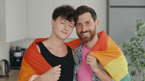 happy gay couple showing pride