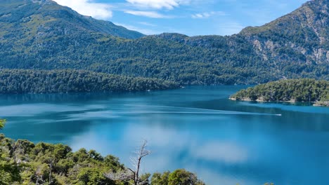 Beautiful-Patagonia-landscape-with-a-turquoise-river-and-mountains-filled-with-forest,-Argentina