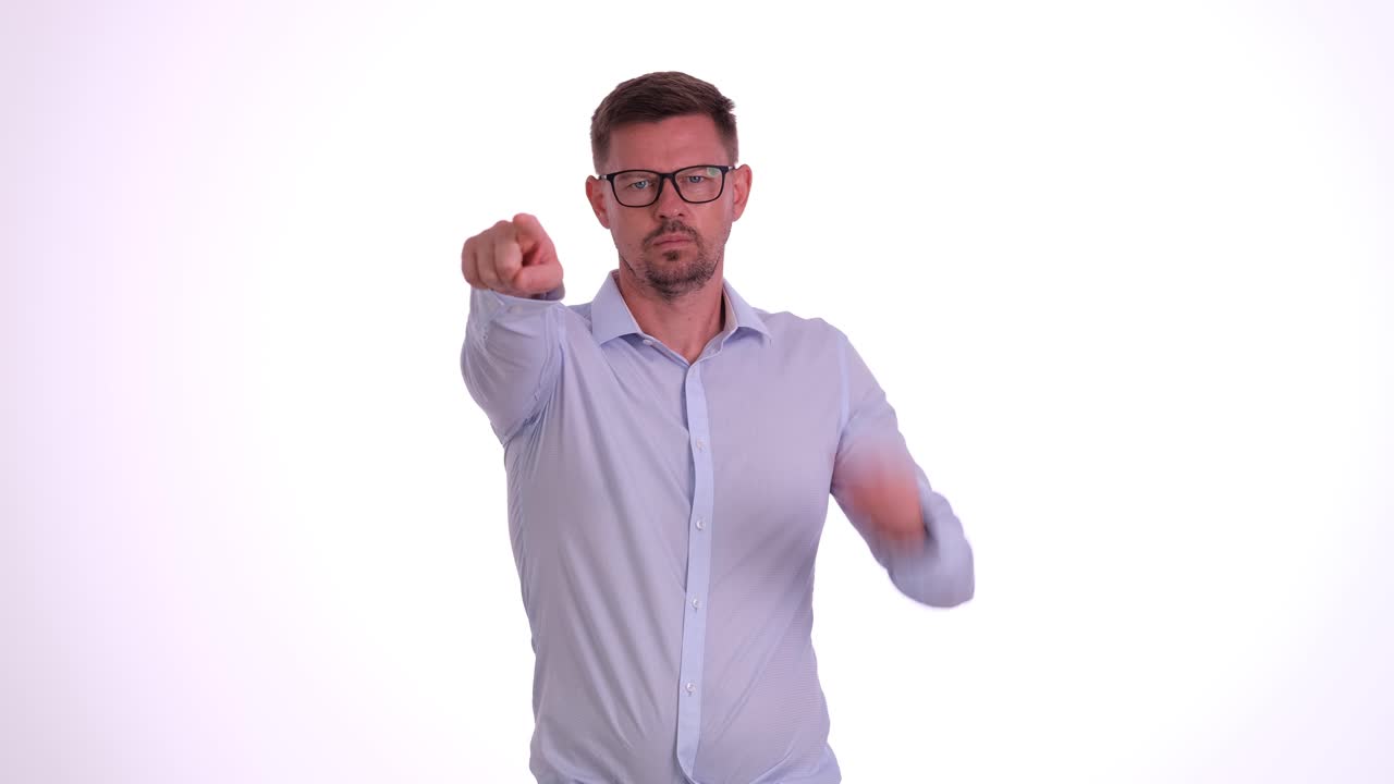 Man in shirt and glasses pointing at the camera