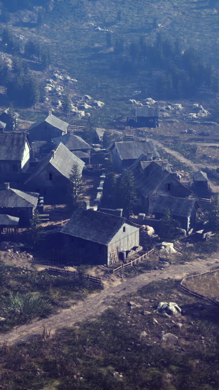 Overgrown village nestled in a lush mountainous landscape at sunset