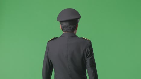 pilot in uniform on green screen