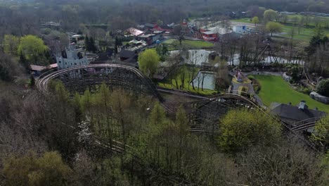 Gulliver's-world-Warrington-rollercoaster-theme-park-aerial-amusement-rides-tracks-descending-tilt-up