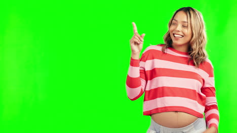 Studio,-pointing-or-happy-pregnant-woman-on-green