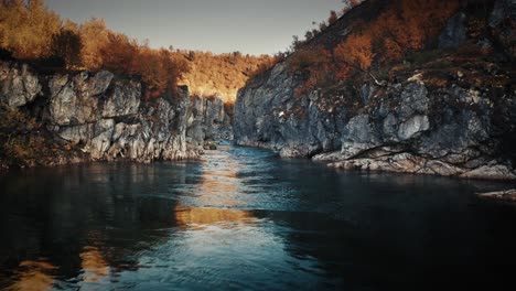 ground-level view of the borselva river flowing in the deep gorge of the silfar canyon, norway