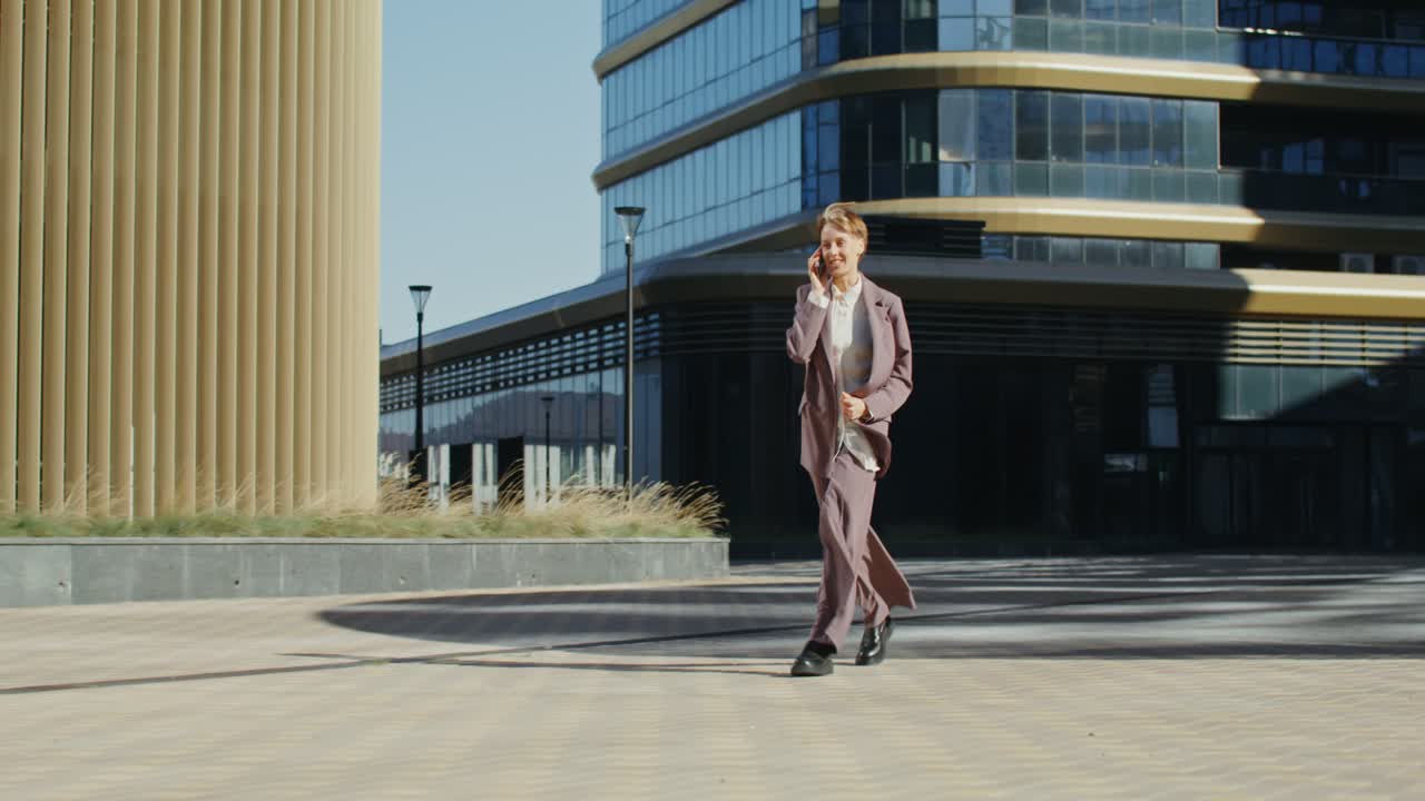 Businesswoman Talking on Phone in City