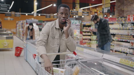 man shopping at grocery store