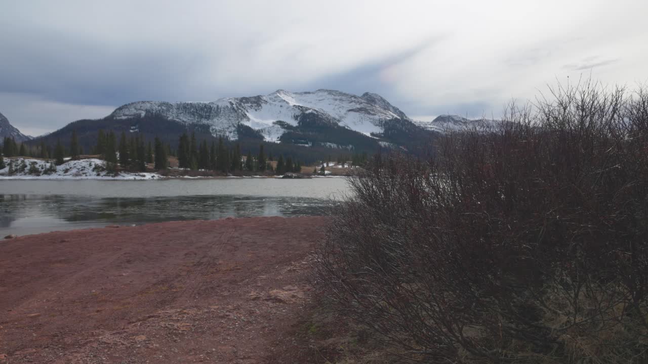 Rocky Mountains with lake in Colorado walking forward with gimbal in slow motion