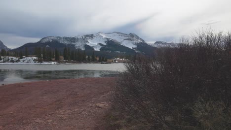 rocky mountains with lake in colorado walking forward with gimbal in slow motion