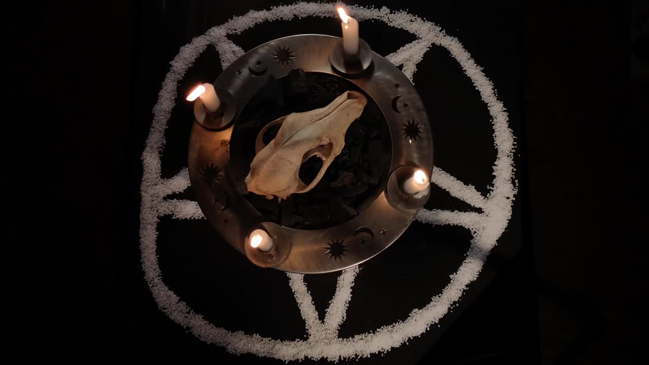 Metaphorical still life of occult symbols