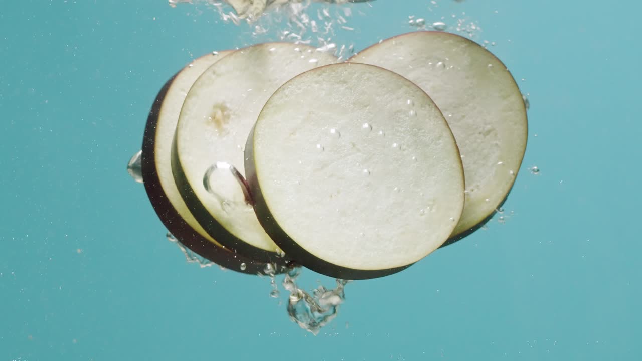 Eggplant Slices Underwater