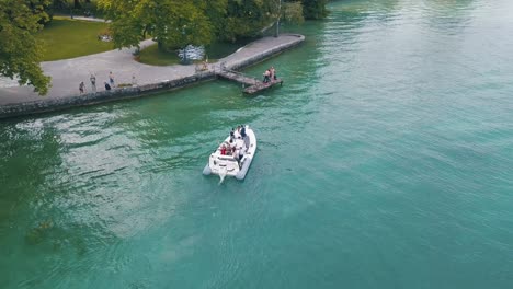 lake with boat and park