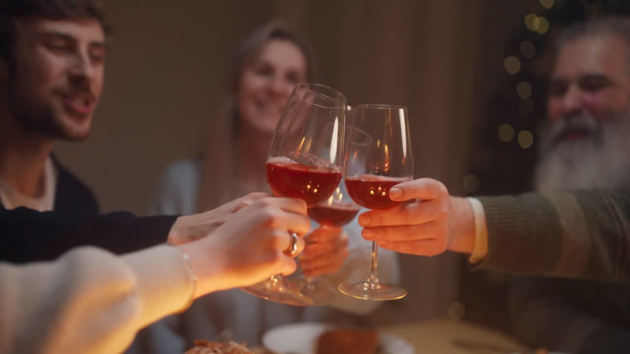People toasting at a dinner party