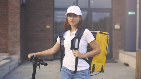 woman delivery person with scooter