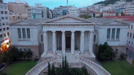 the national library of greece, front of the building with a statue