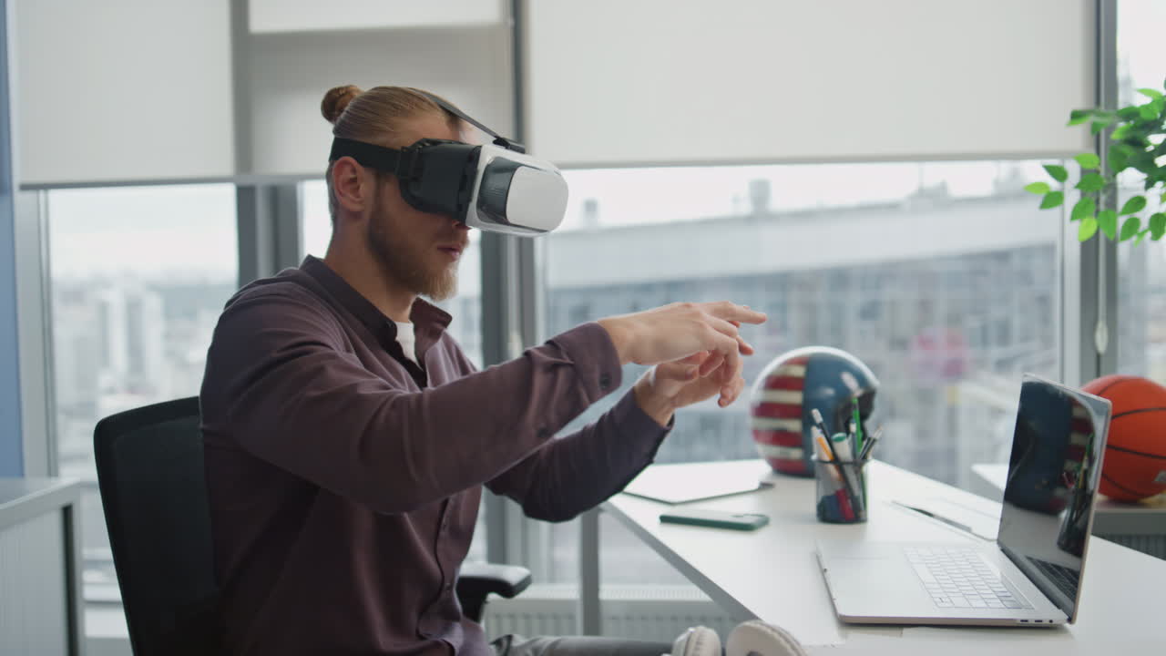 Vr man touching hands interactive world at workplace. Programmer testing 3d game