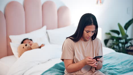 sick child in bed, mother and phone for advice