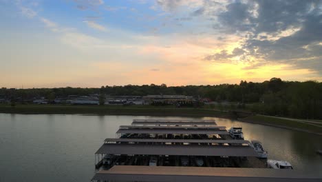 flying over the boat docks at clarksville marina during sunrise