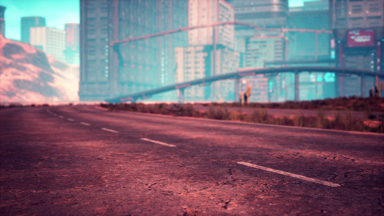 중간 모래 언덕의 비어 있는 사막 도로