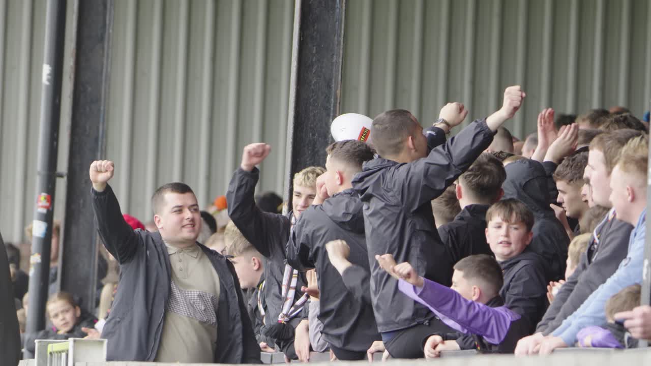 In unison, chanting they all respond, roaring force, a mighty bond