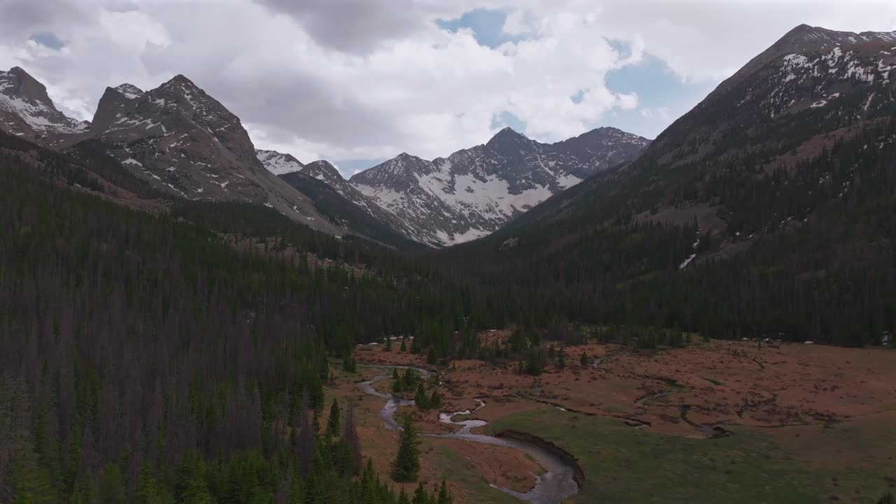 Huerfano River valley Blanca Peak Mt Mount Lindsey Lily Lake trail Sangre de Cristo Range Colorado aerial drone spring Summer San Isabel forest Iron Nip ple Rocky Mountains gray clouds circle left