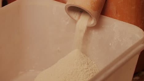 machinery making flour in wheat flour in bakery or factory, electrical mill machinery. wheat against diseases and insects using modern equipment. clip. concept of food industry. small business concept . high quality 4k footage