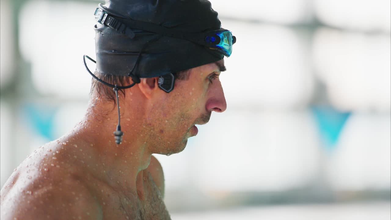 A Dedicated Swimmer Preparing for a Competition, Showcasing Focus, Determination, and the Thrill of Aquatic Sports During an Intense Training Session
