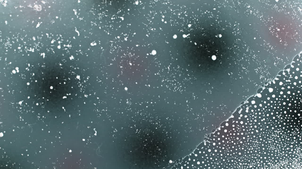 Close-up of substances mixing in a dynamic macro shot, abstract scene
