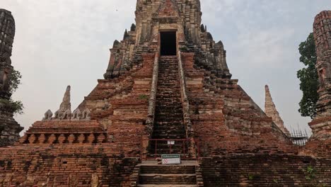 climbing the steps of a historic temple ruin