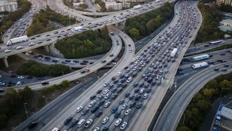 aerial view of busy highway interchange with heavy traffic