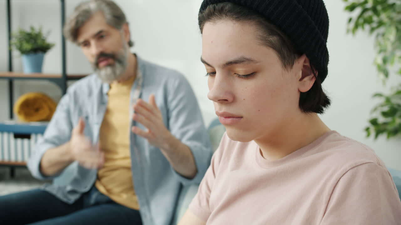 Teenager and Father in Conflict