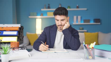 young businessman falling asleep from exhaustion.