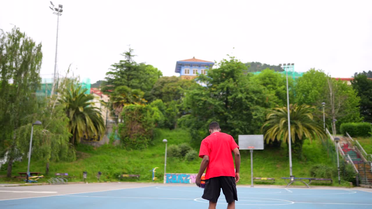 Basketball players on outdoor court