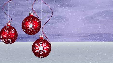 Animation-of-snow-falling-over-red-christmas-baubles-decorations