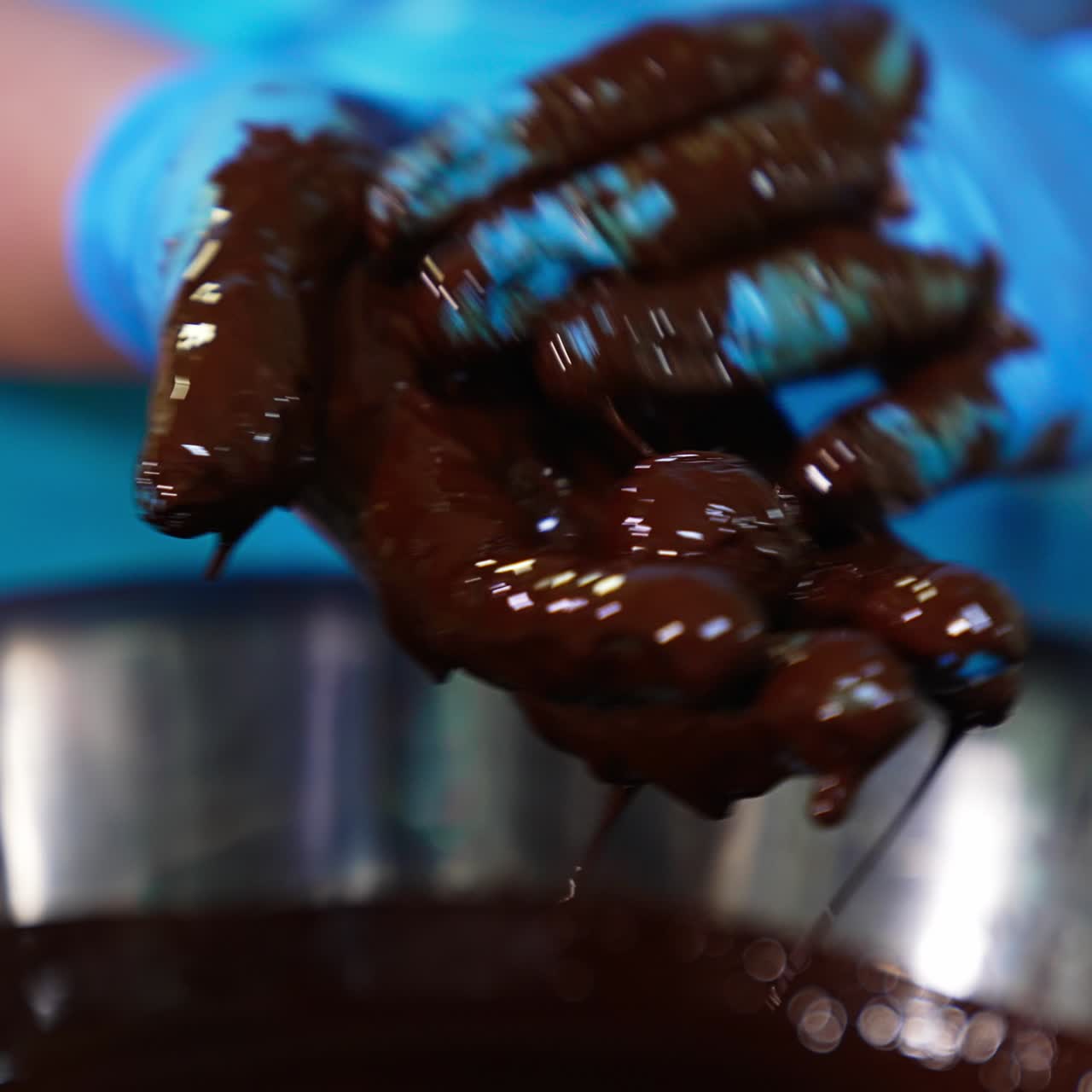 Hands covered in chocolate