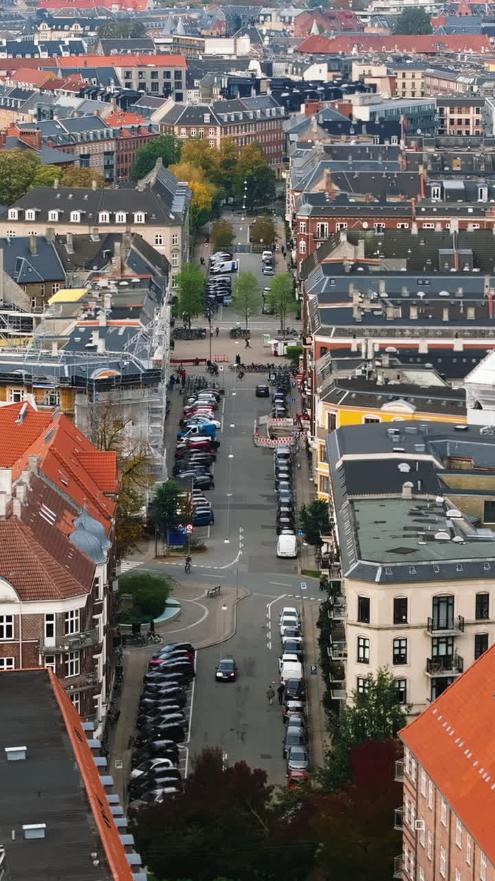 Aerial drone view of Vesterbro district in Copenhagen, Denmark in daylight. Vertical
