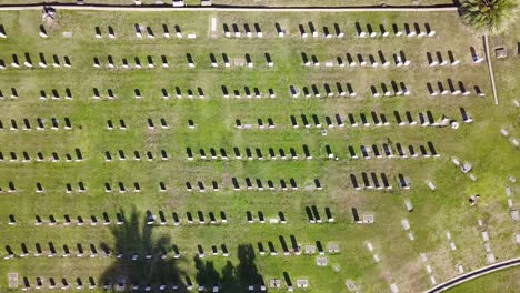 aerial view over a cemetery, in the neighborhoods of los angeles, california, usa - tilt, drone shot