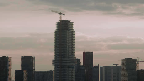 city of rotterdam waking up in this pinkish sunrise timelapse