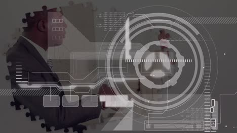 animation of statistics and data processing over businessman handshake