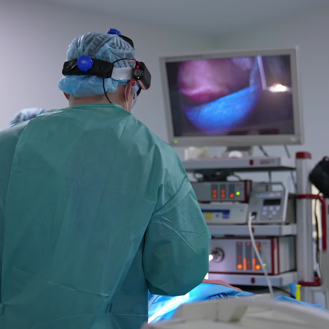 Neurosurgeon doctor in operating room. Team surgeon at work in operating emergency ward