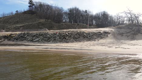 Structural-rocks-holding-back-the-dunes-of-lake-Michigan