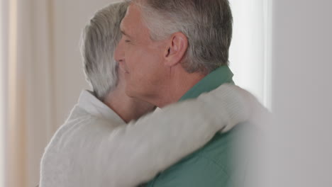 happy mature couple dancing at home enjoying romantic dance together celebrating relationship milestone having peaceful retirement 4k