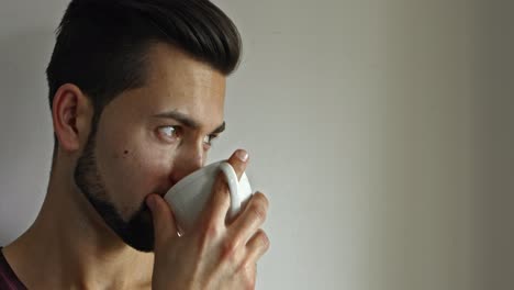 man drinking coffee and planning his life