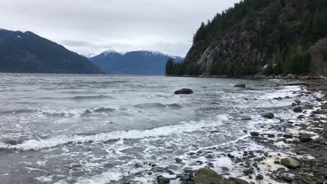 Porteau-Cove-Marina-Park's-mountains-and-coastline,-panning-long-shot