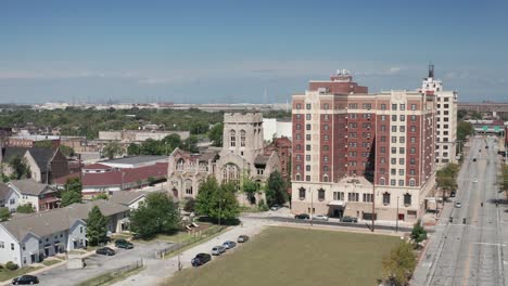 Abandoned-historic-City-Methodist-Church-in-Gary,-Indiana-with-drone-video-wide-shot-moving-in