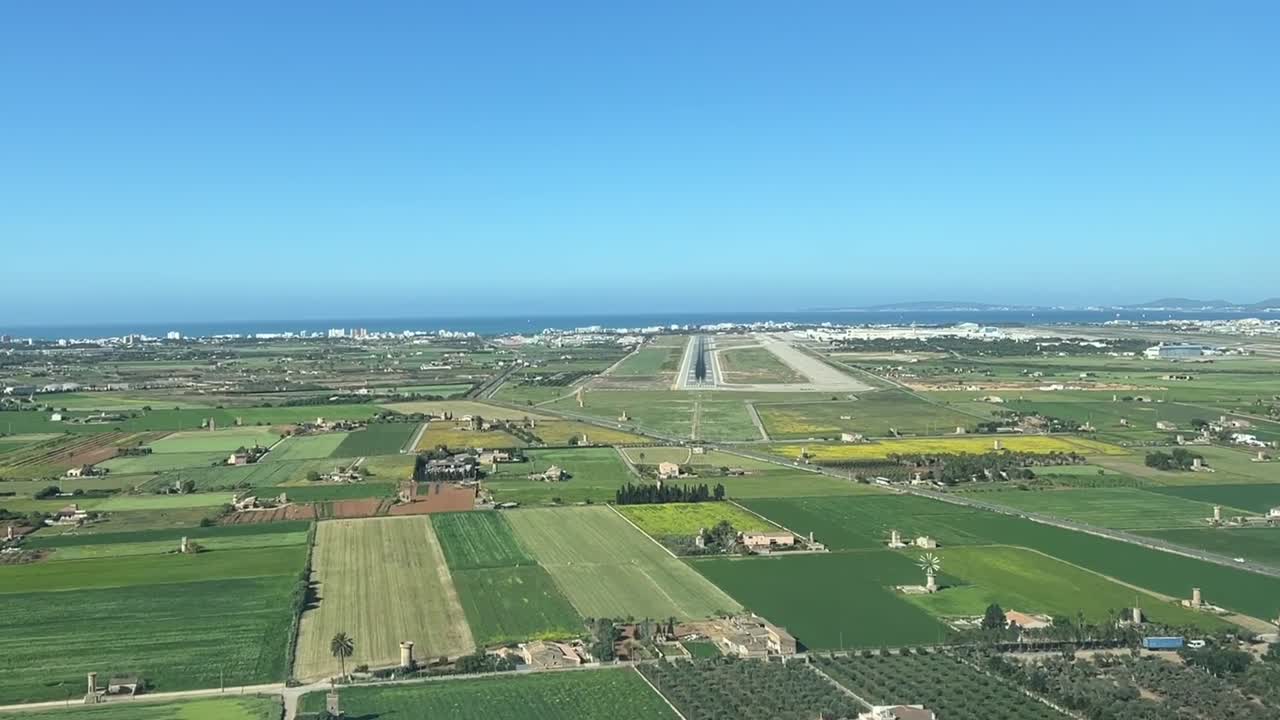 Aerial view from a cockpit approaching to land, daylight