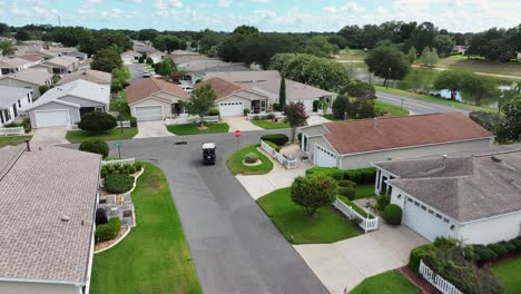 golf cart driving through the villages, florida neighborhood